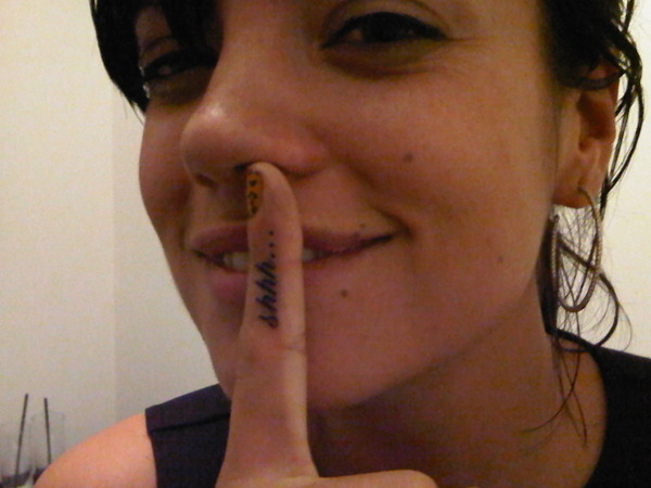 Finger Tattoo; Lindsay Lohan made her do it.