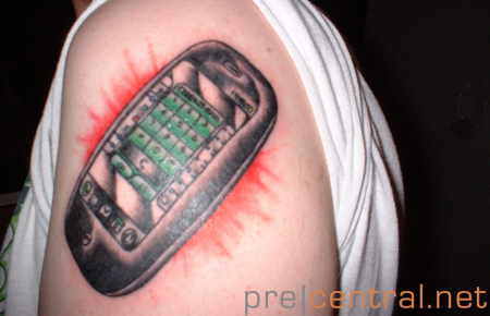 palm pre tatoo Guy Tattoos Palm Pre On Shoulder For Free Phone.