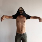 resident evil darkside chronicles game shirt 150x150 Resident Evil: The Darkside Chronicles Zombie Flip Shirt. Expose the Belly For A Cool Face.